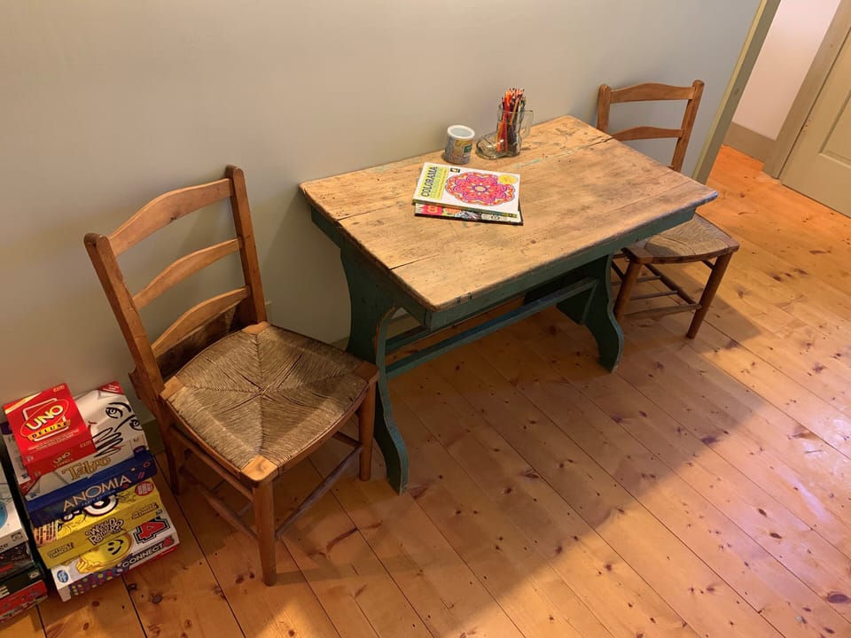 Game area - puzzles, cards, books, board games.