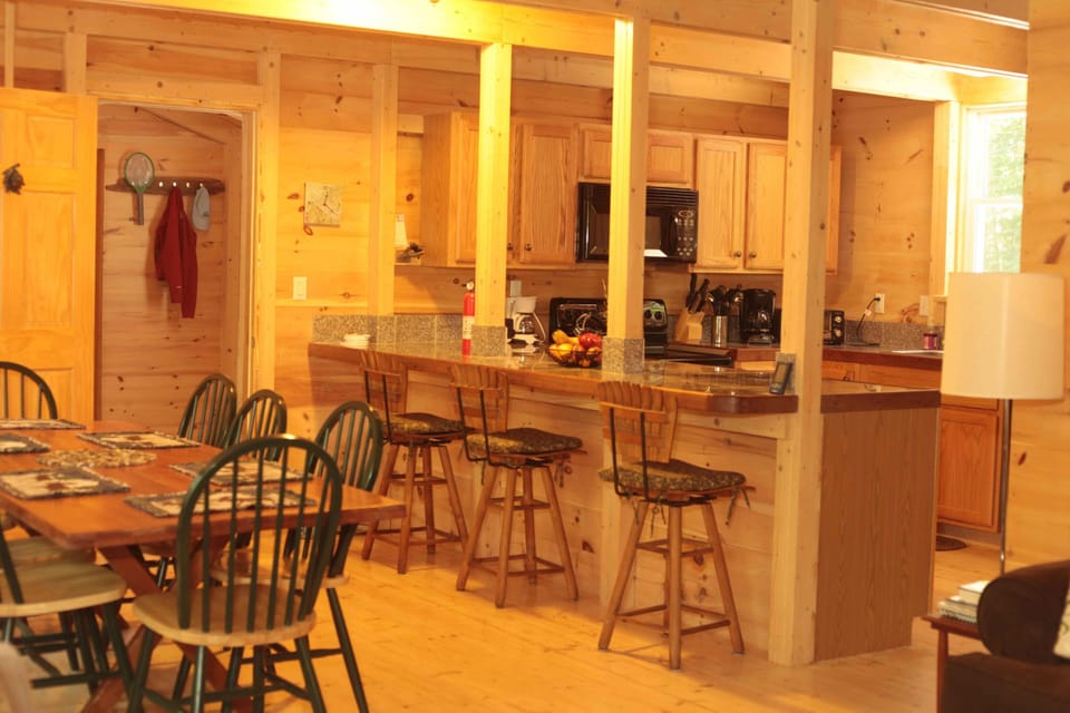 Dining and kitchen
Seating for 10 at table
3 at bar