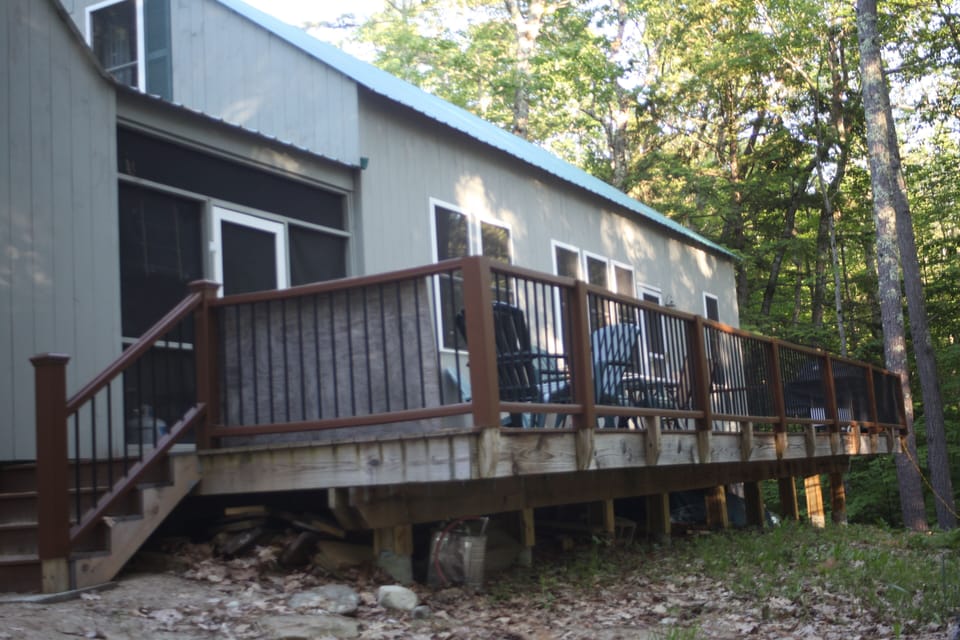 Access stair to deck.  Access also through living room and porch doors