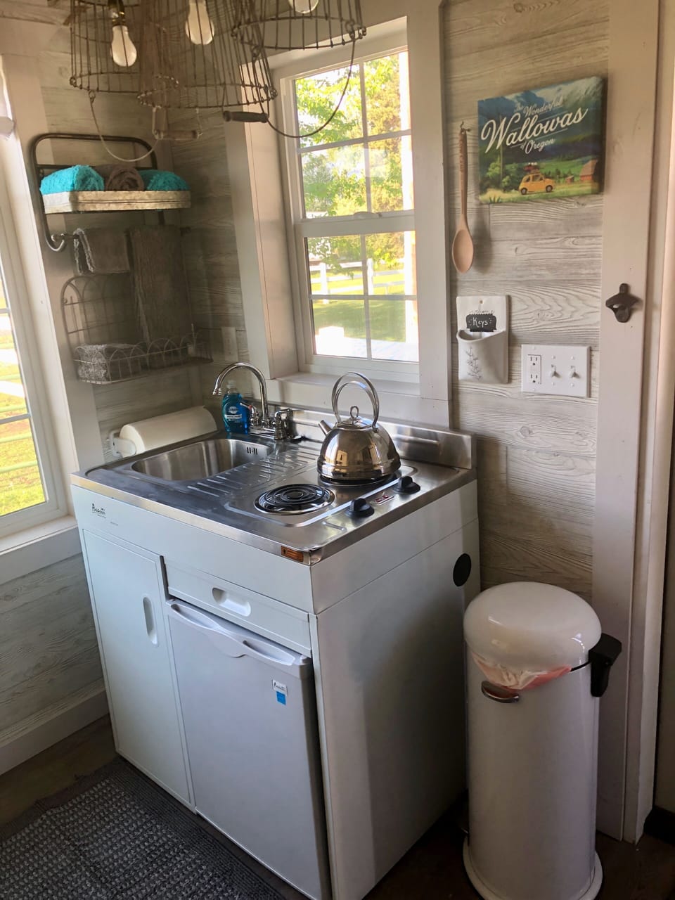 kitchenette includes sink, two burners and mini fridge