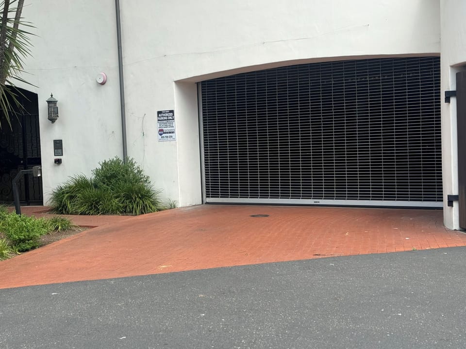 Private covered assigned gated and well lit parking garage