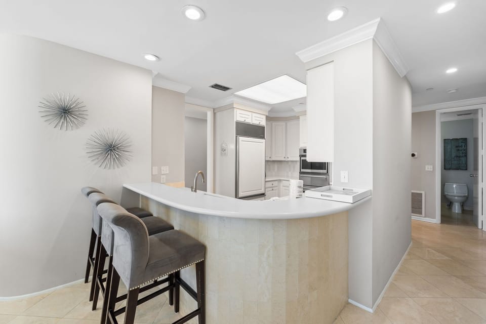 3 large comfortable barstools are perfect for visiting with the chefs!