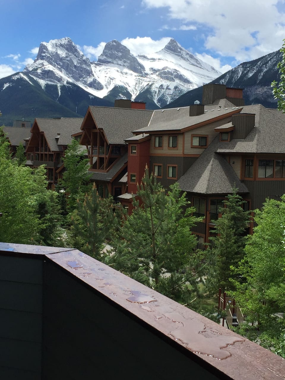 SE view from the balcony on the Three Sisters, signature mountain of Canmore.