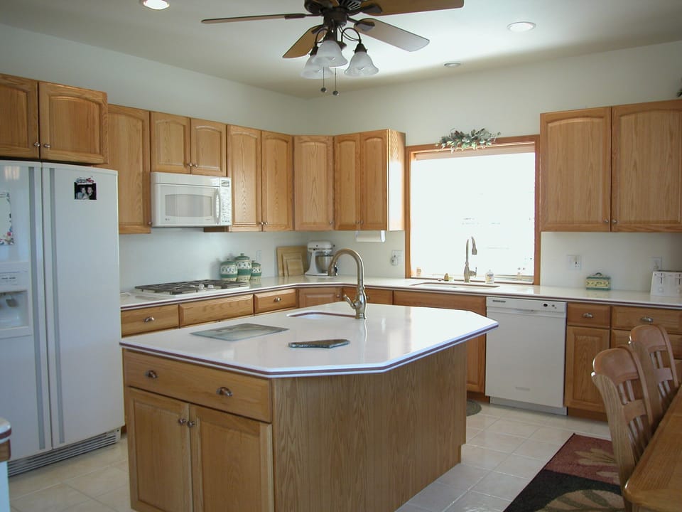 Kitchen is bright & light and fully appointed with appliances & cookware.