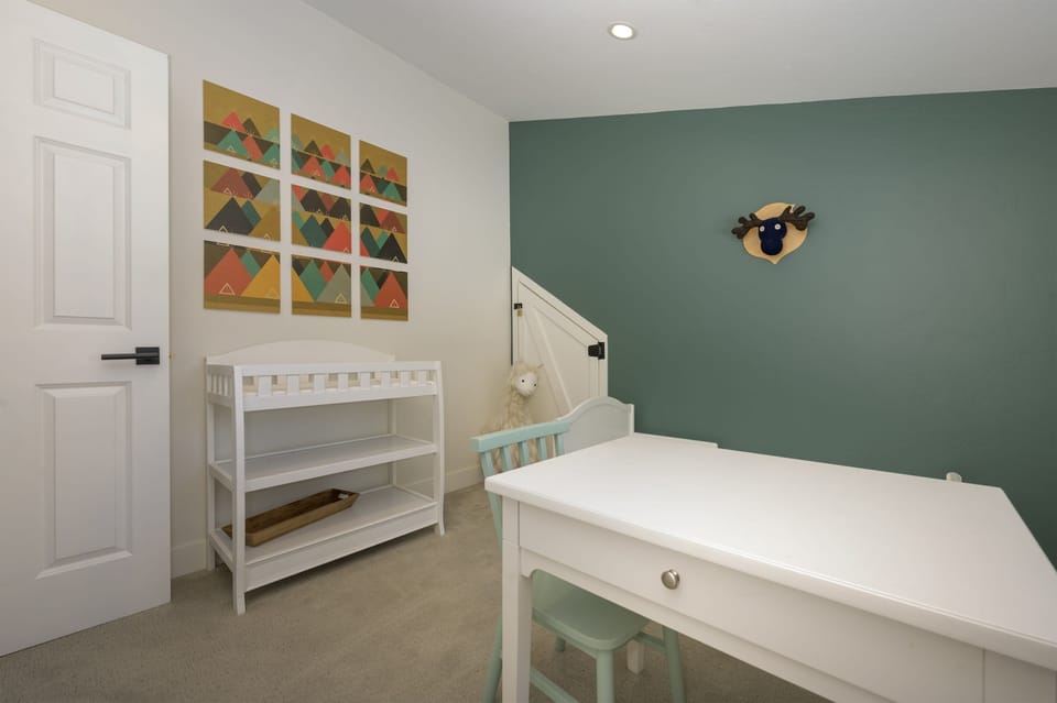 Kids room - Kid table and a diaper changing station
