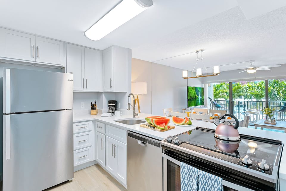 Sleek and modern kitchen with brand-new appliances and open layout