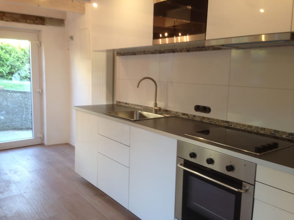 The Kitchen has a stove, oven, microwave and dishwasher