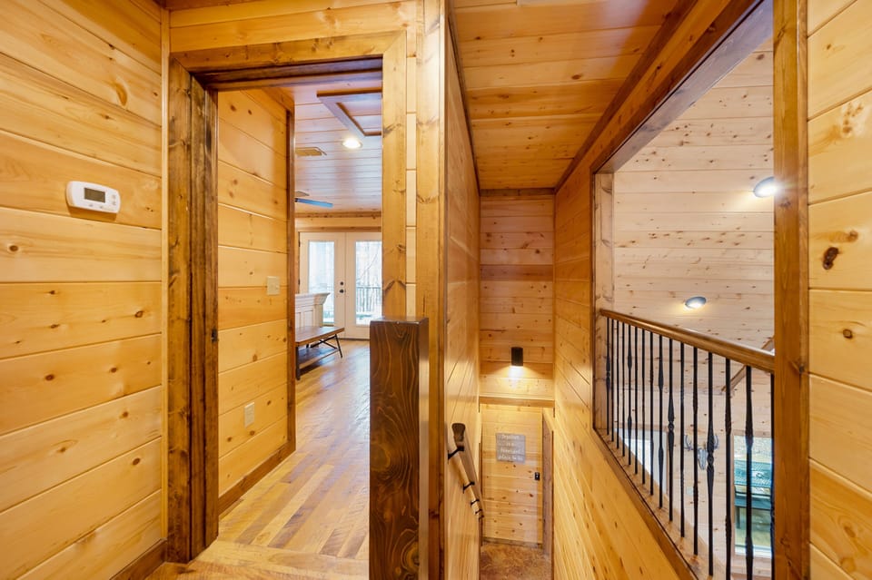 with the bunk room and additional king bedroom tucked away upstairs, guests can enjoy make the most of their own space in the cabin