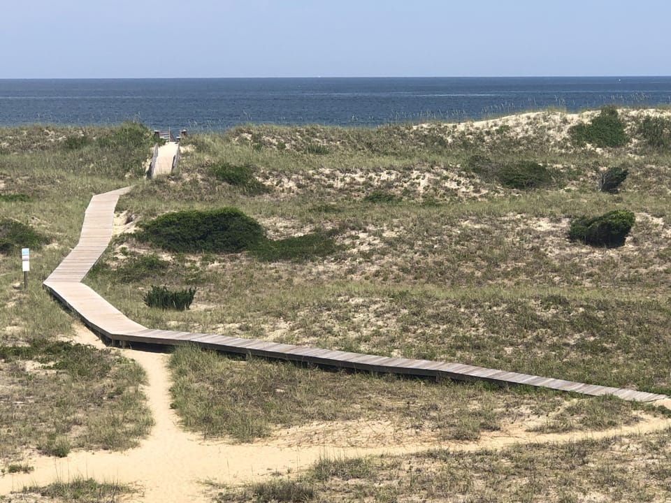 Boardwalk to beach for easy access - beach buggy wagon and chairs provided! 