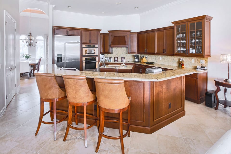 Kitchen with top of line equipment and dinner wears