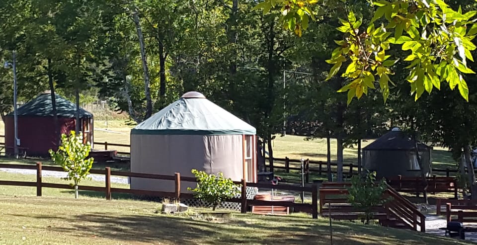 Early Fall pic of 3 yurts  (Dancin' Wolf Yurt is not shown) place is waterfr