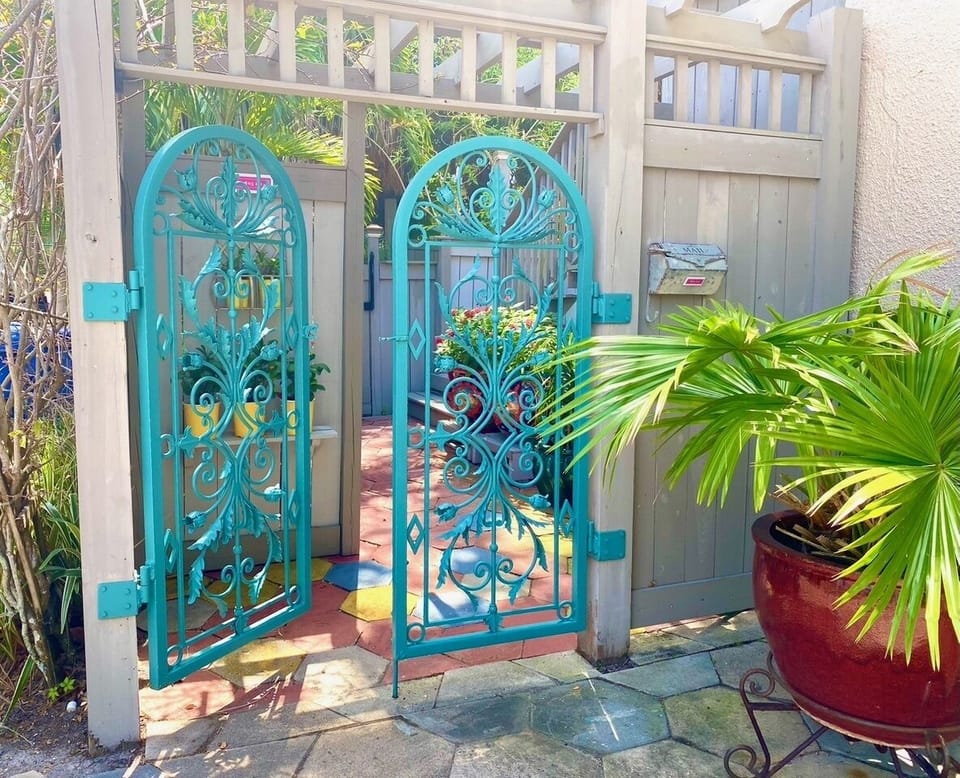 Enter through antique gates to private court yard.