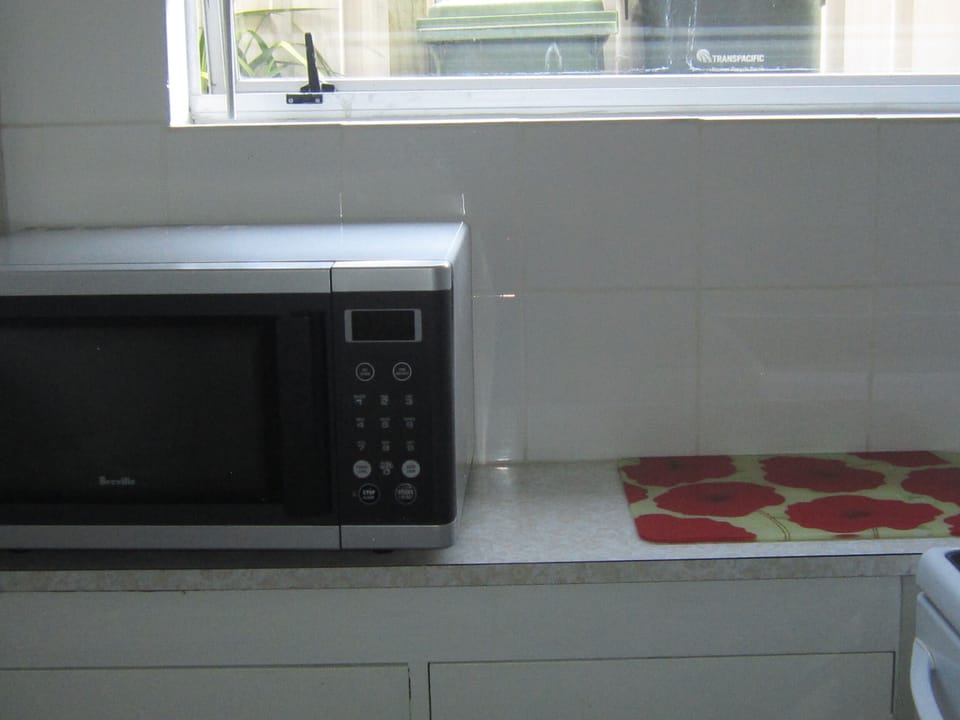 Microwave and bench space.