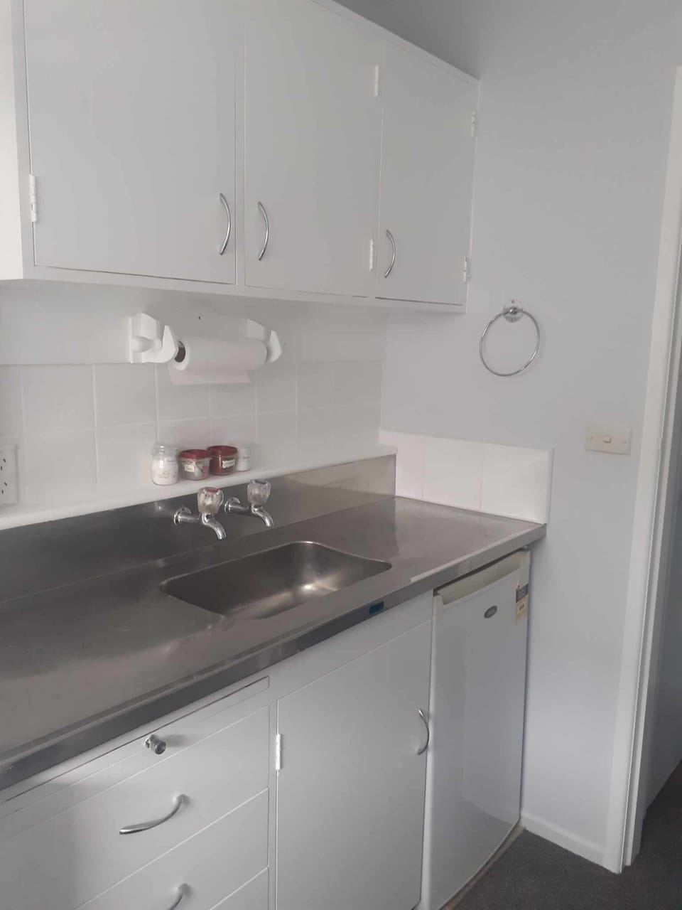 Stainless steel bench top, paper towel, tea, coffee and sugar to start.