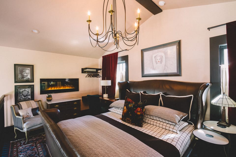 Lofted Bedroom- Plush King size bed, writing desk, electric fire place 