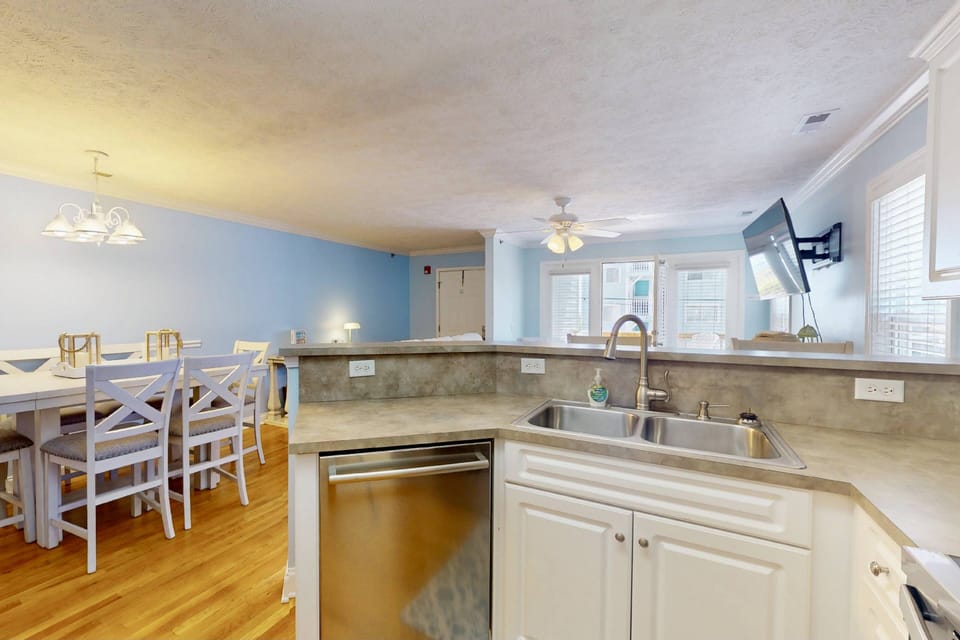 The kitchen is open to the dining and living rooms to allow conversations while cooking!