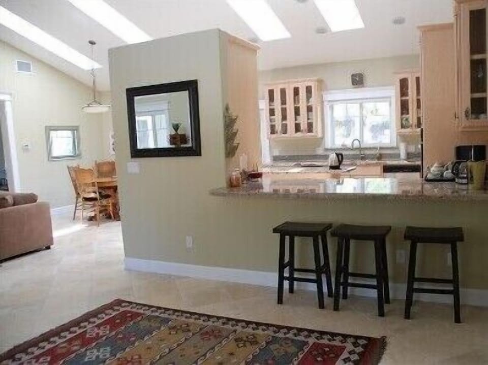 Bar has solid Granite top great for Snacks, Games or addl Dining