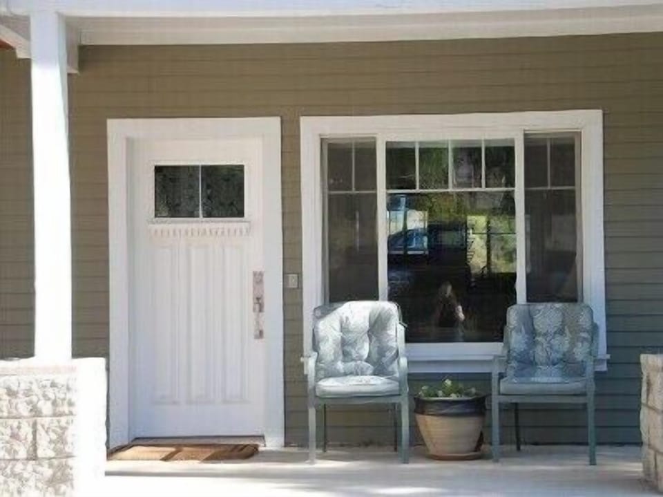 Relax on covered porch after day tripping &amp; watch the sun set.