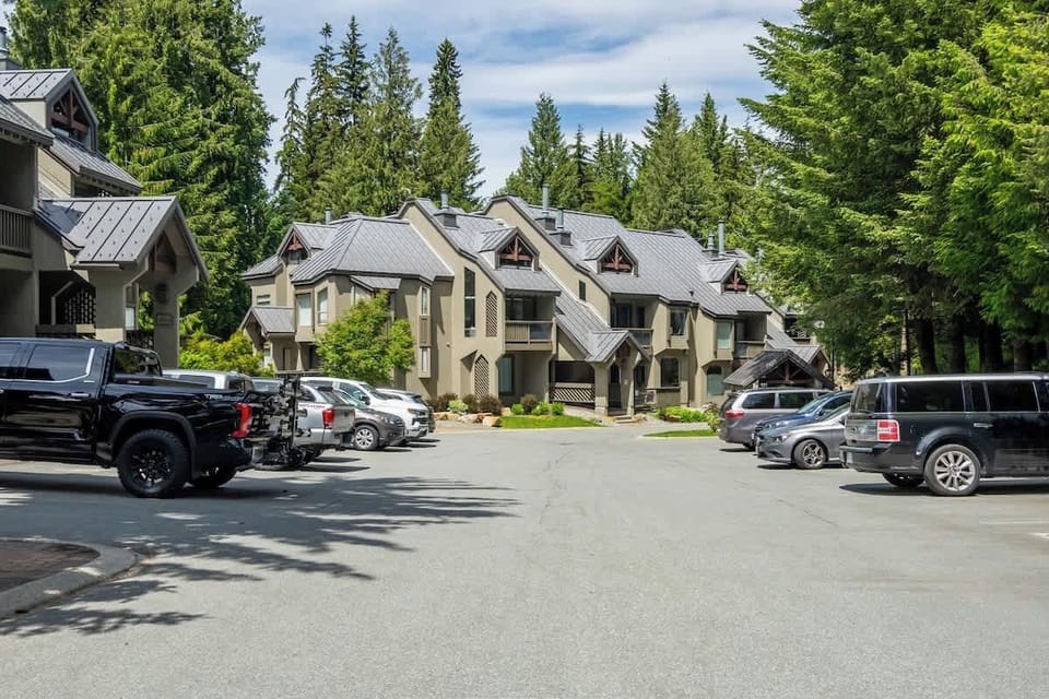 - Convenient on-site parking with easy access to your Whistler home  
- Mountain-style townhomes nestled among tall evergreens  
- Perfect base for exploring slopes, lakes, and local trails  