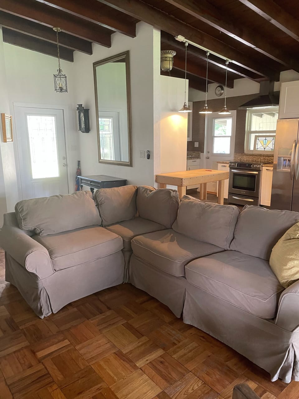 Living room looking into open kitchen