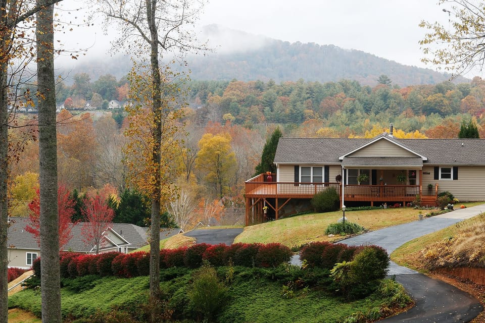 Front of the house, private driveway on the left