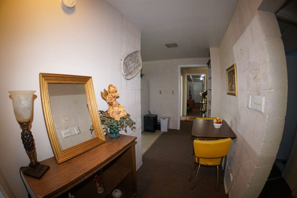 Hallway - hallway downstairs between bathroom, bedrooms, and kitchen.