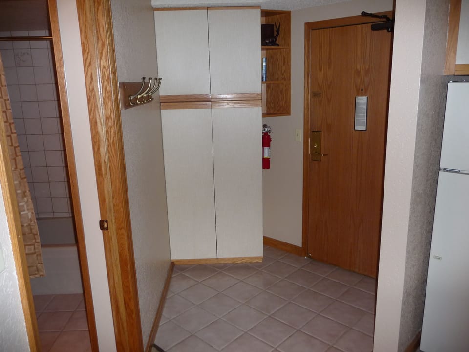 Entry area; cabinet & hooks for coats, gloves, hats, etc.