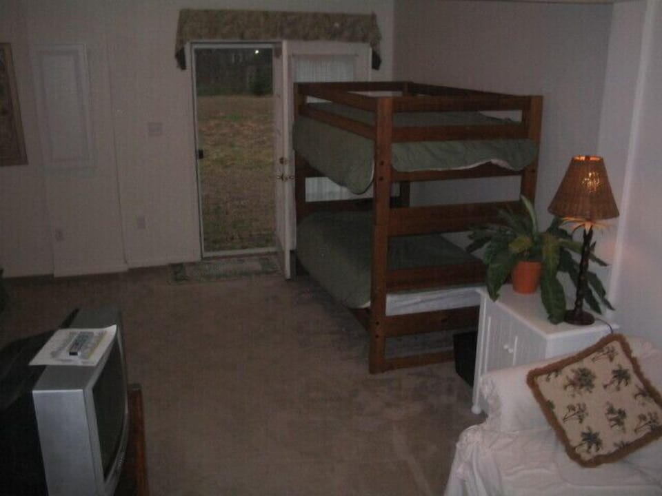 Partial Lower-level view. Includes queen bed, full bath & sitting room with TV