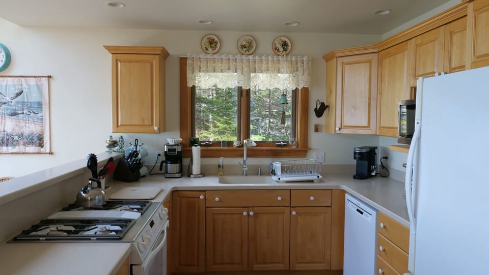 Fully equipped kitchen with ample counter space. 