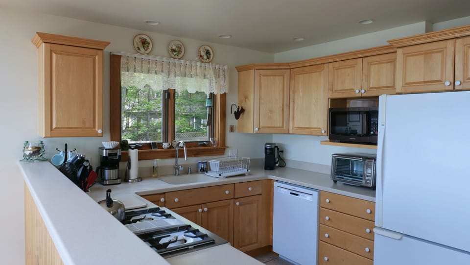 Kitchen with pass-through bar for easy serving and hosting.
