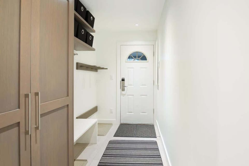 - Entryway with sleek storage and ski gear space  
- Whistler vacation home designed for adventure ease  
- Organized comfort for smooth mountain getaways  
