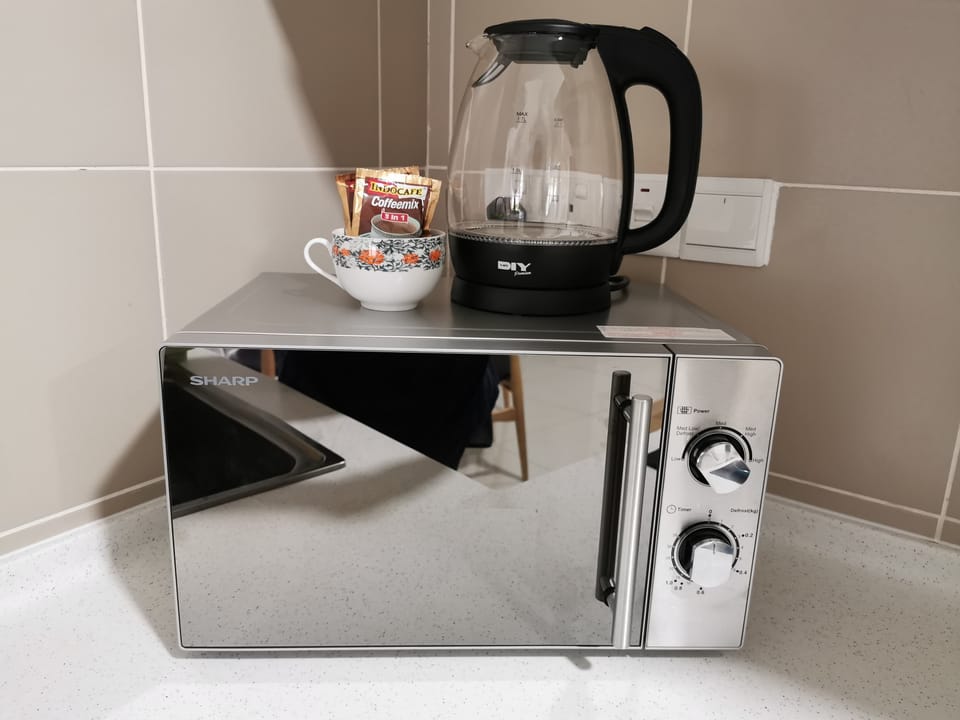Microwave and coffee tea. 