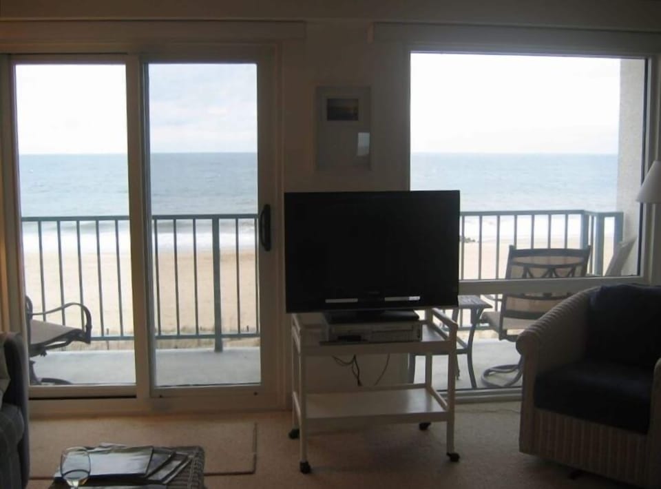 Soak in the ocean view while watching your flat screen tv.
