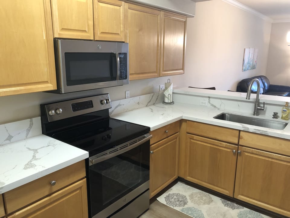 Kitchen with new stainless steel appliances