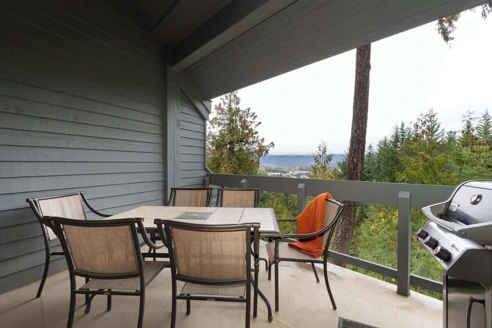 - Covered balcony with dining area and peaceful forest outlook  
- Enjoy fresh air meals or evening drinks surrounded by nature  
- BBQ grill ready for mountain cookouts all year round  
