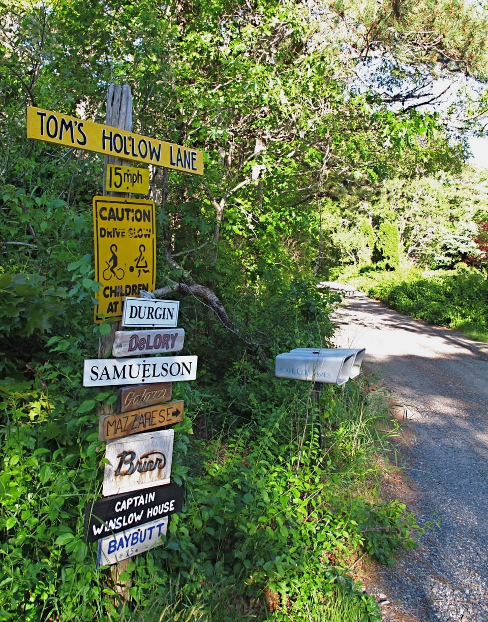 Old-fashioned signboard marks the entrance to our private lane