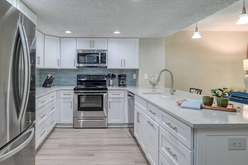 This updated kitchen provides plenty of space to cook your favorite meals!