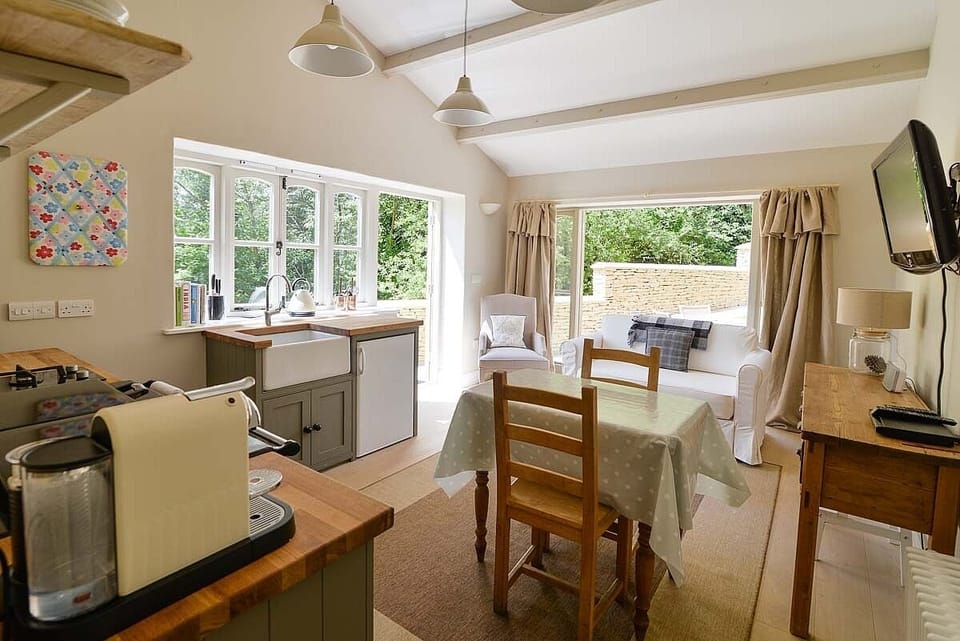 The living/dining space enjoys a great deal of natural light.