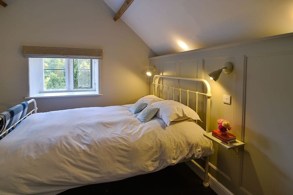 Stylish wood paneling in the bedroom.