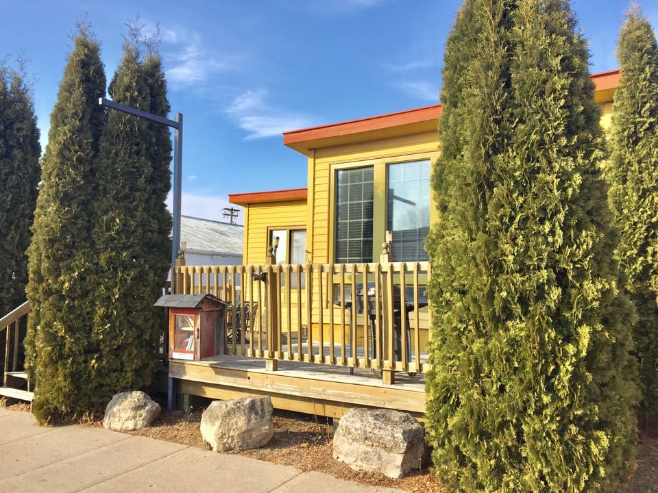 Large outdoor social area on this iconic Candy Store made cabin conversion.