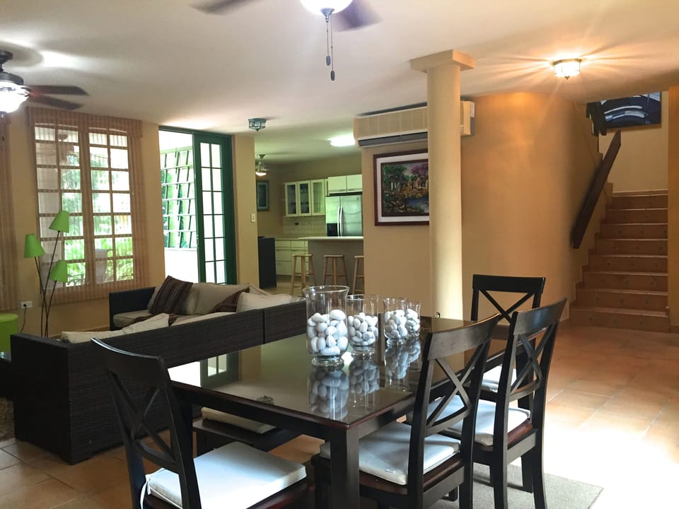 The dining area seats six, with the stairs leading to three bedrooms upstairs, 