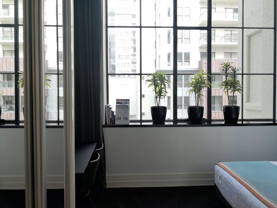Wardrobe. Desk/Dining area.  Free unlimited internet. 