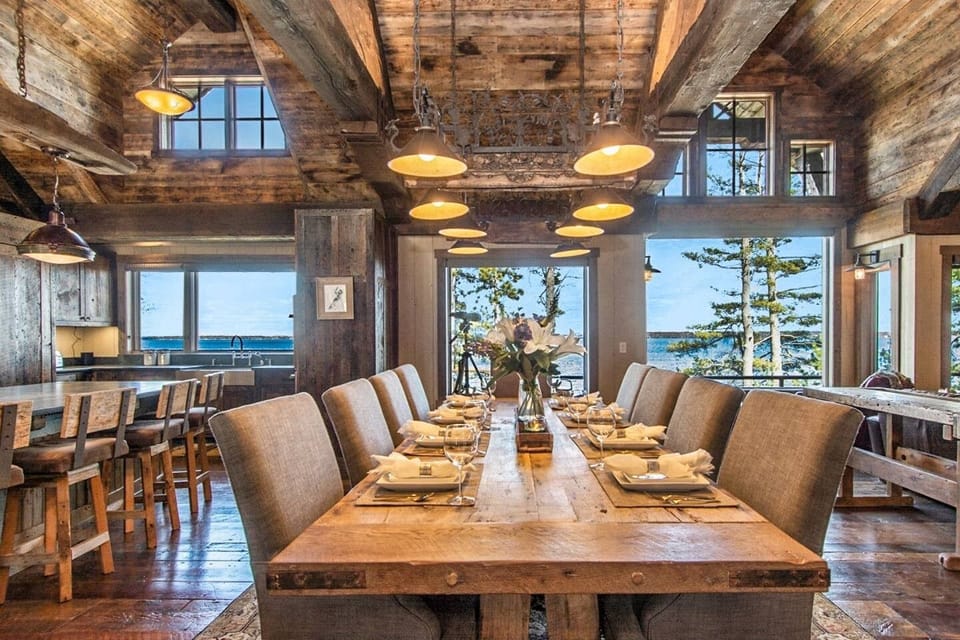 The oversized dining room table seats 10 with additional bar top seating for 5