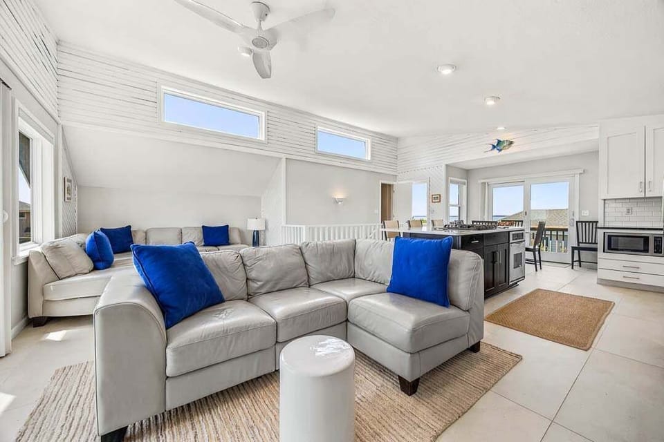 Top-Level Living Room with Deck Access
