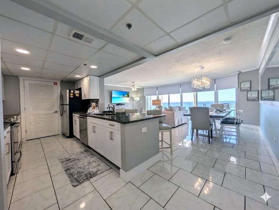 Bright, open kitchen and dining area with ocean views