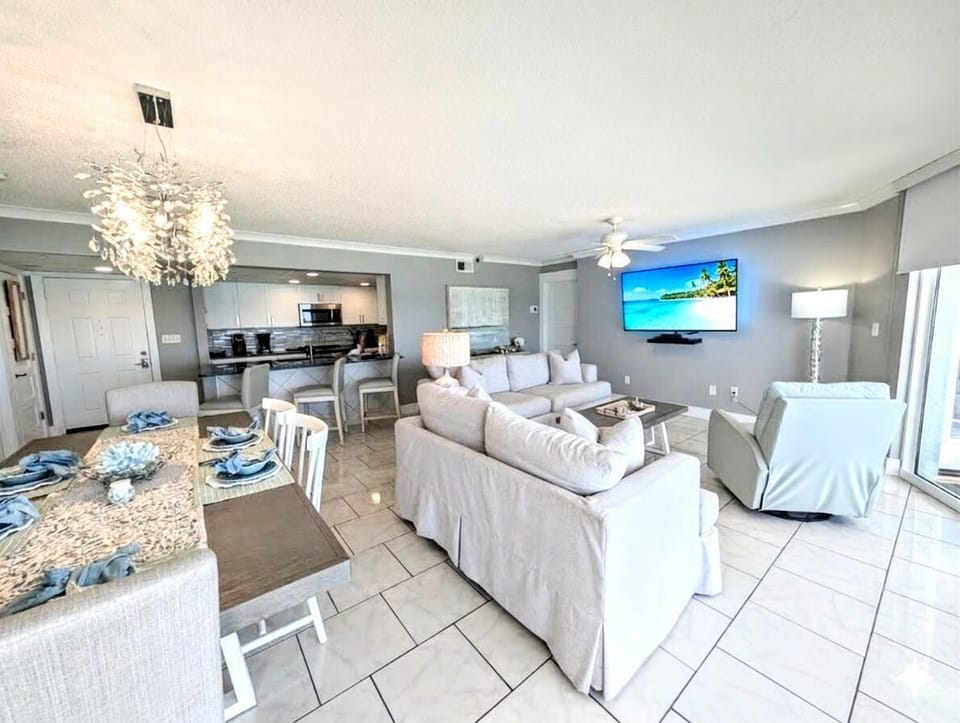 Bright open living and dining area with ocean views