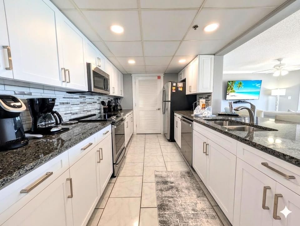 Bright, modern kitchen with sleek granite countertops and stainless appliances