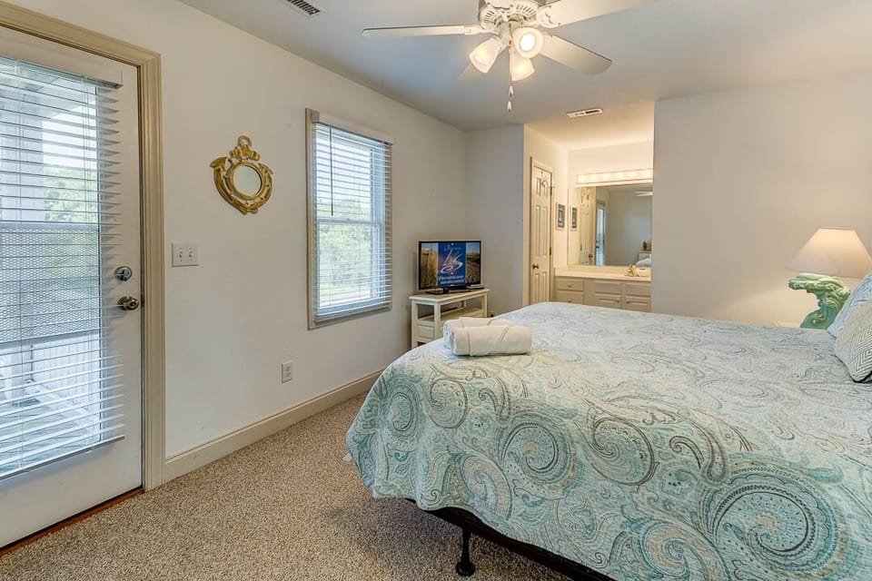 Mid-Level Queen Master Bedroom with Deck Access