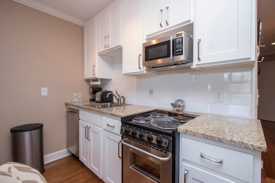 Seaside Villas 238 - Kitchen with Stainless Steel Appliances - The newly refurbished kitchen has stainless steel appliances and granite counter tops.
