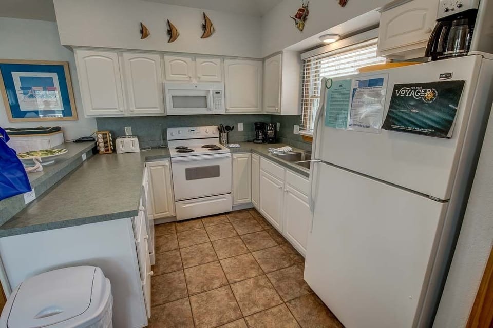 Top-Level Kitchen with Bar seats 3